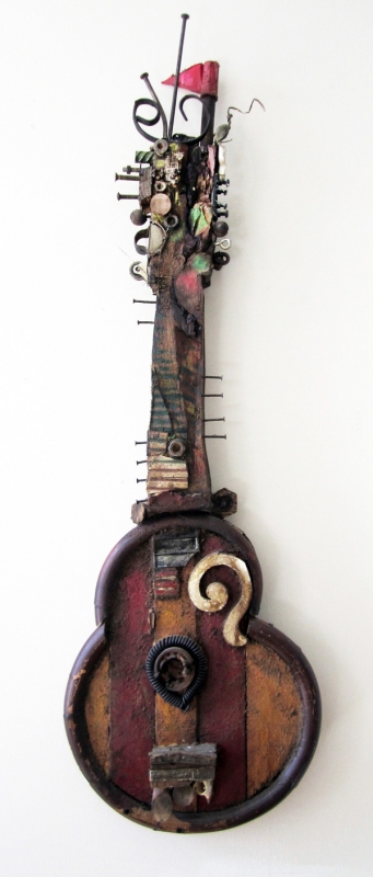 Jorge A. Valdes, Guitar, 2012. Mixed media and found objects, 45 x 14 x 4 inches
